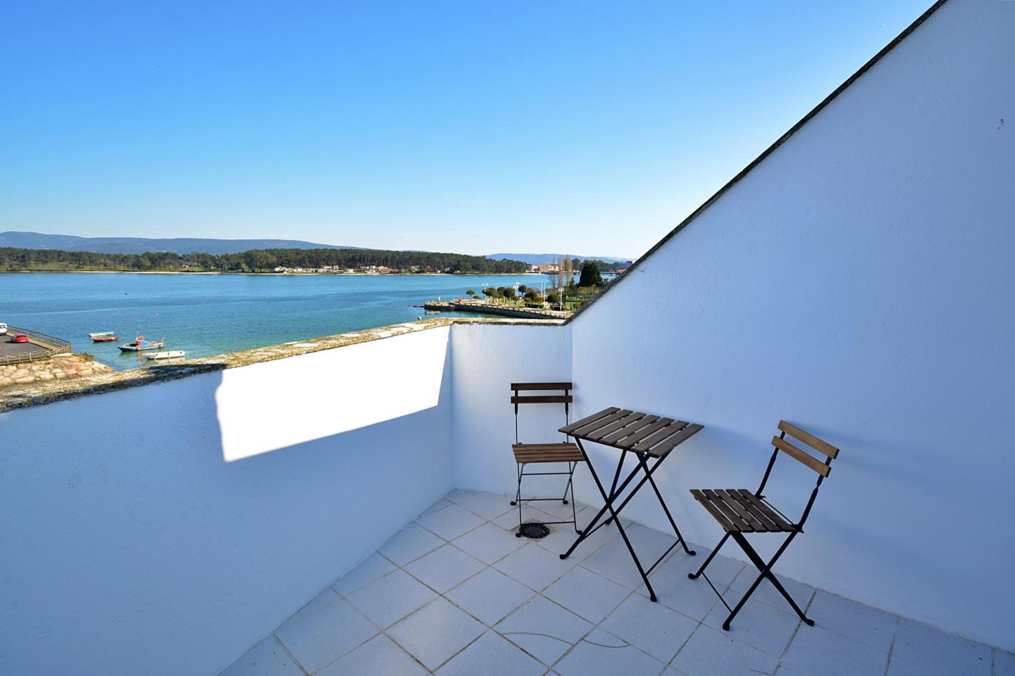 Apartamento Con Terraza Frente Al Mar En O Grove Buitenkant foto